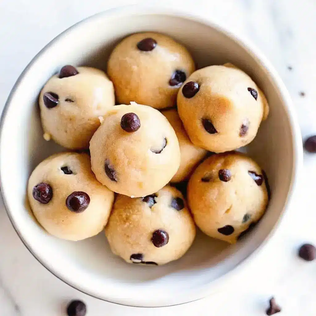 Cookie Dough Bites: Easy No-Bake Treat You Can Make at Home 2 Homemade edible cookie dough balls with chocolate chips in a bowl