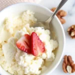 Fat Free Cottage Cheese – Your Complete Guide to Healthy, Creamy Choices 5 Fat free cottage cheese with strawberries in a white bowl