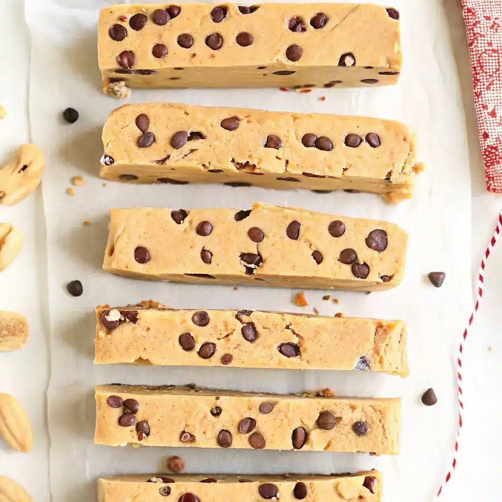 Cookie Dough Protein Bars That Taste Like Dessert and Fuel Your Goals 3 Rows of homemade protein bars filled with mini chocolate chips