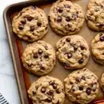 Homemade peanut butter oatmeal chocolate chip cookies on baking tray