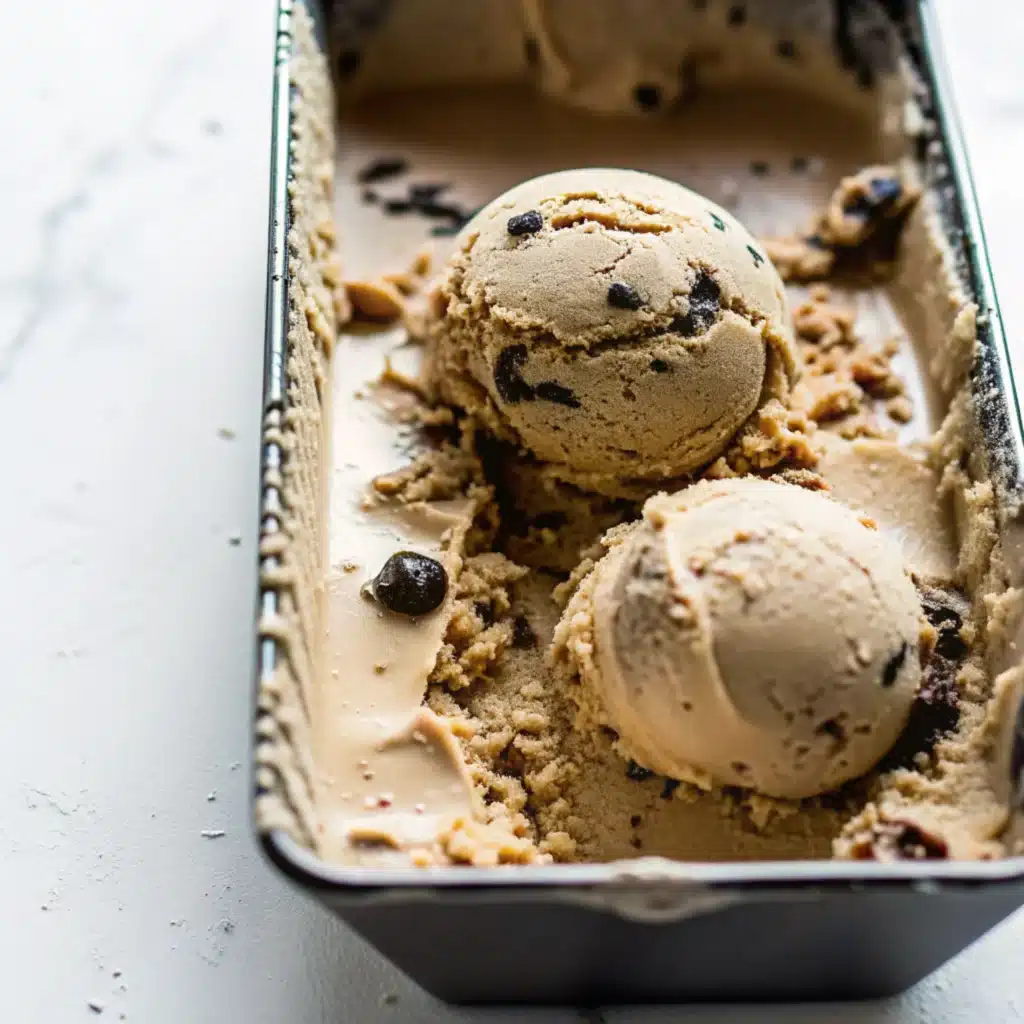 Vietnamese Coffee Ice Cream – Bold Flavor in a Cool Treat 1 Scoops of Vietnamese coffee ice cream in a loaf tin